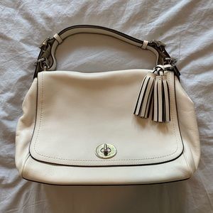 White Coach purse with short strap and detachable long strap. Includes dust bag.